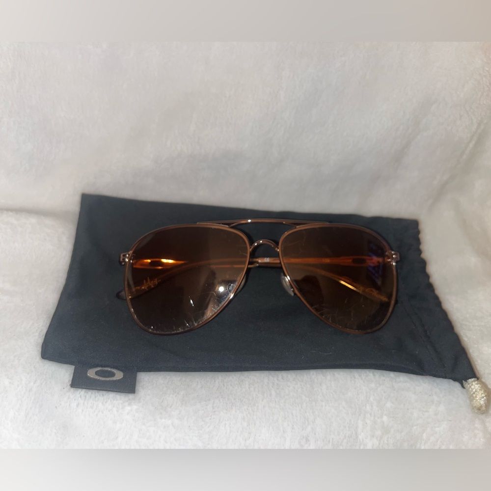 Oakley Caveat in Rose Gold Sunglasses with Amber Lenses and black cloth bag